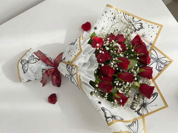 Butterfly Kisses: 15 Red Roses & Baby's Breath Bouquet