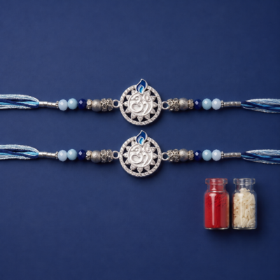 Divine Silver Om & Sapphire Blue Rakhi (Set of 2)